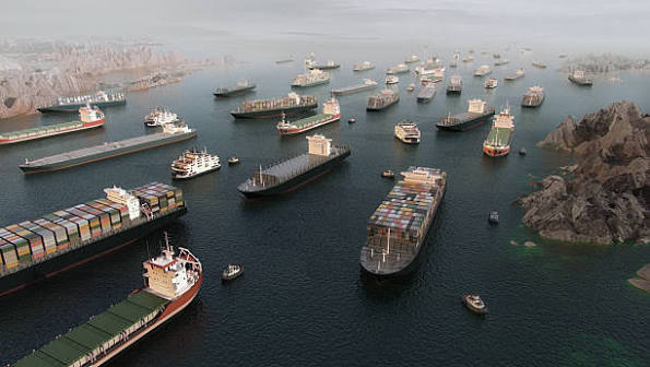 Aerial view of cargo ships queued in the Strait of Hormuz