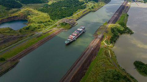 Aerial view of container ship transiting the Panama Canal